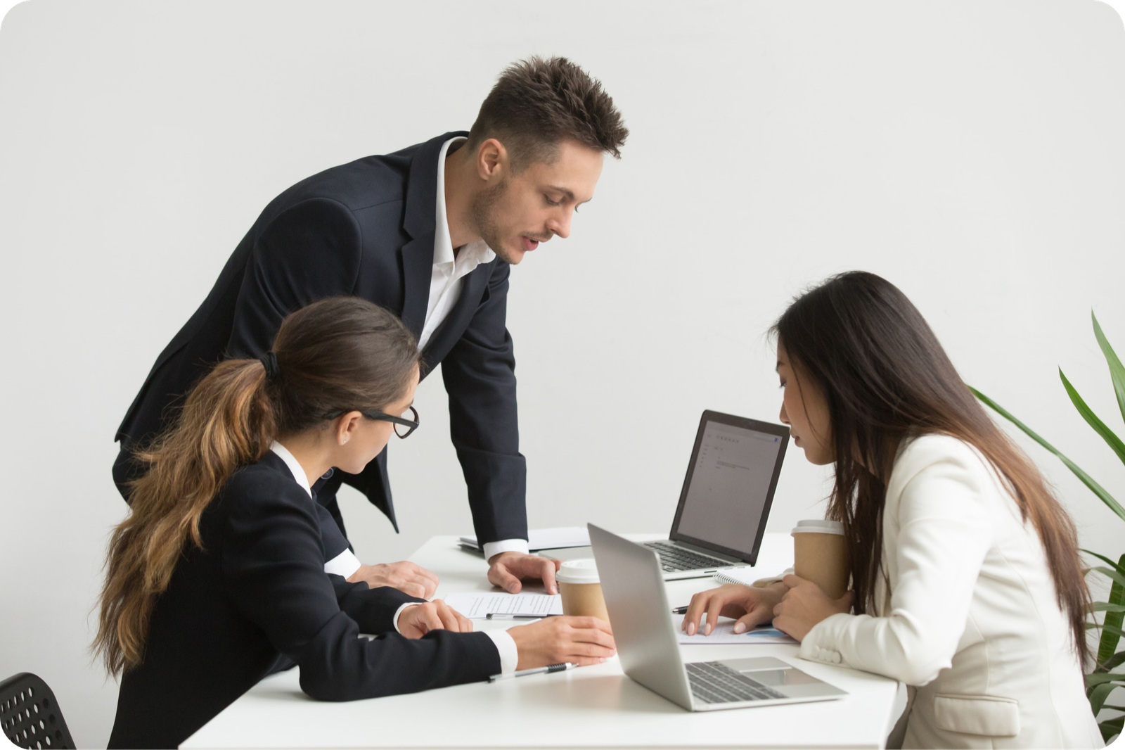 company-workers-brainstorming-during-board-meeting-modified company-workers-brainstorming-during-board-meeting-modified